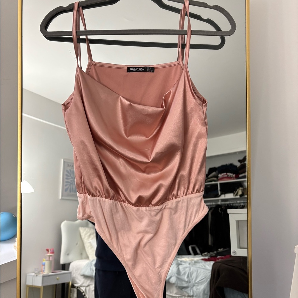 Pink body suit